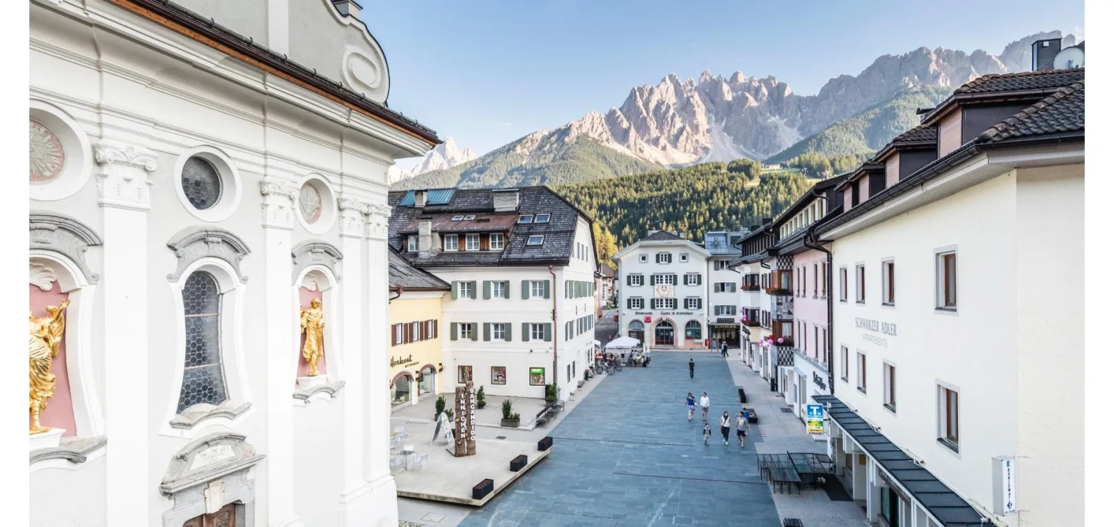 Historic centre of San Candido with the Dolomites in the background